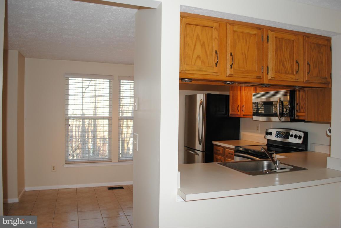 1943 Belmont Ridge Court Reston, VA 20191 - Photo 7 of 26 a view of workspace with a window