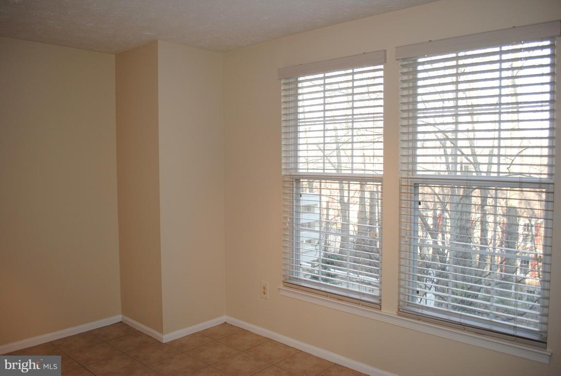 1943 Belmont Ridge Court Reston, VA 20191 - Photo 9 of 26 a view of an empty room with a window