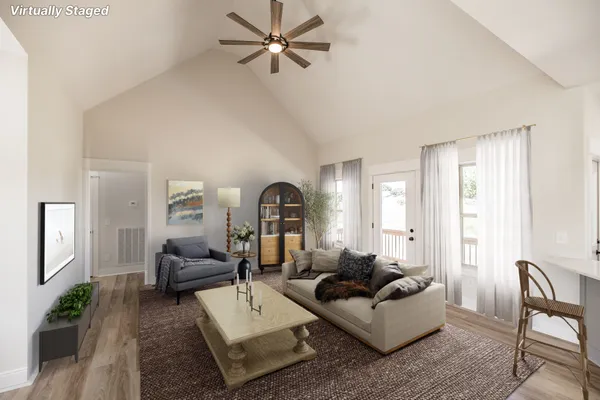 a kitchen with a sink cabinets appliances and a window