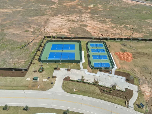 a view of swimming pool with seating space