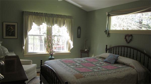 11 Rice Corner Road Brookfield, MA 01506 - Photo 13 of 30 a bedroom with a bed and a window