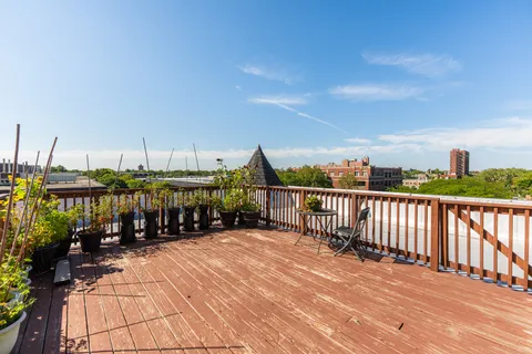 a view of balcony with yard