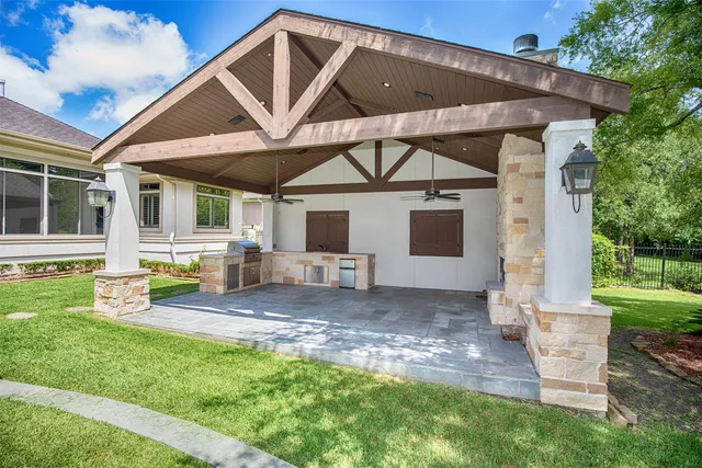 a view of pool with yard