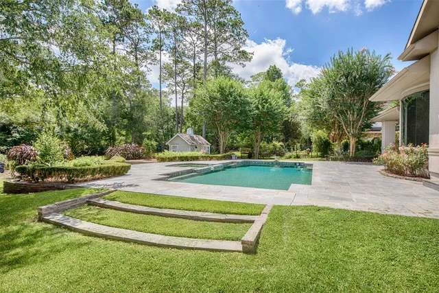 a view of a field with trees