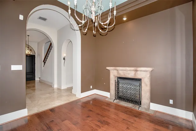a view of a livingroom with wooden floor