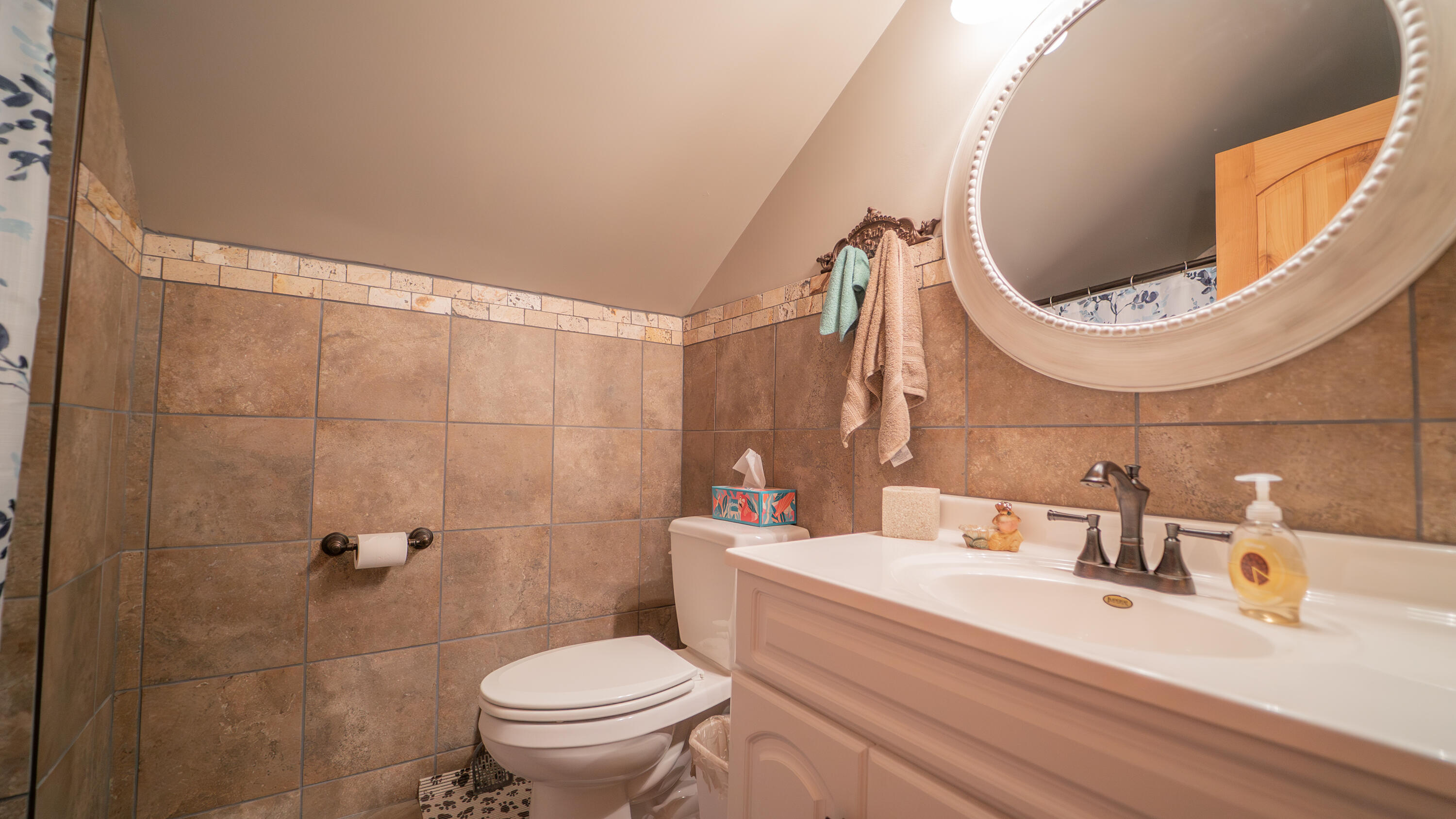 5099 Sage Road Plymouth, IN 46563 - Photo 12 of 35 a bathroom with a sink mirror toilet and a mirror