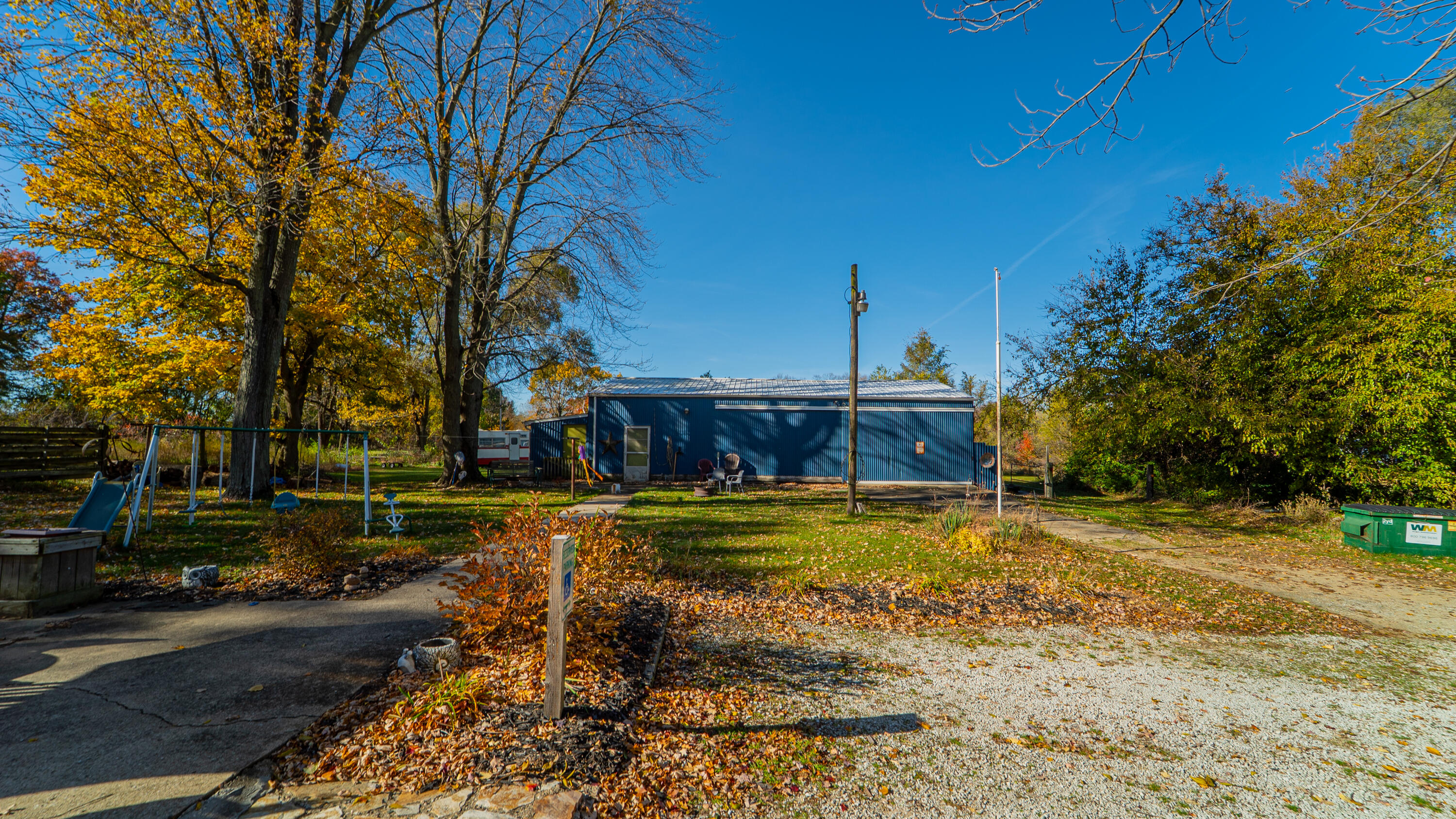 5099 Sage Road Plymouth, IN 46563 - Photo 20 of 35 a view of a house with a yard
