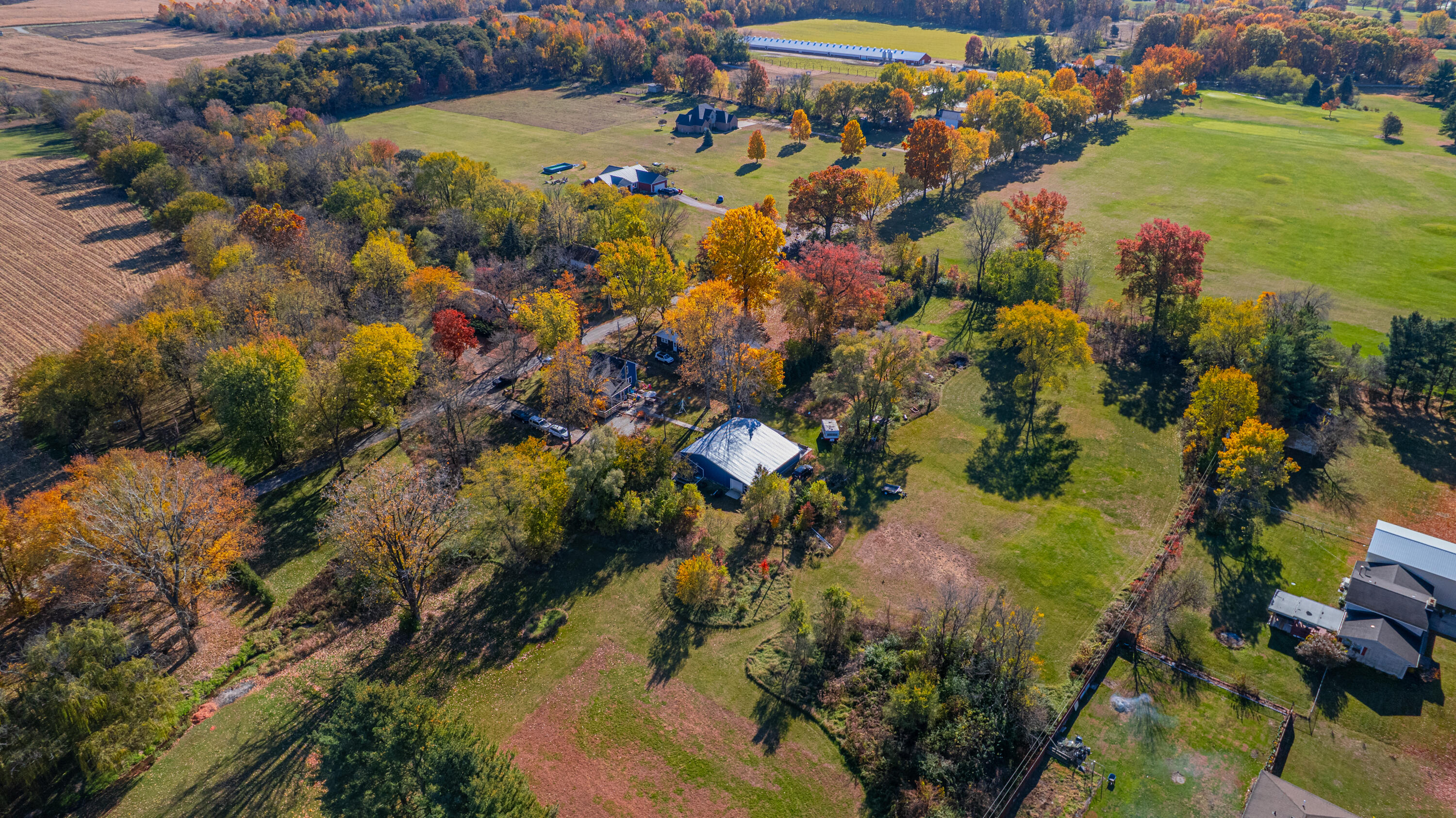 5099 Sage Road Plymouth, IN 46563 - Photo 25 of 35 a view of a lake with houses