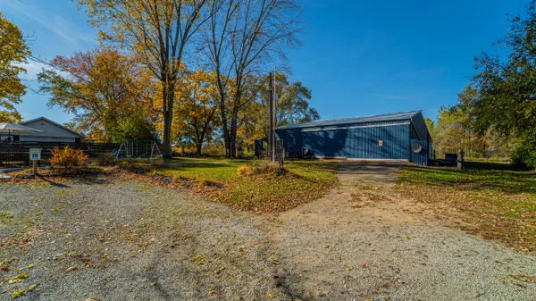 a view of swimming pool with a patio