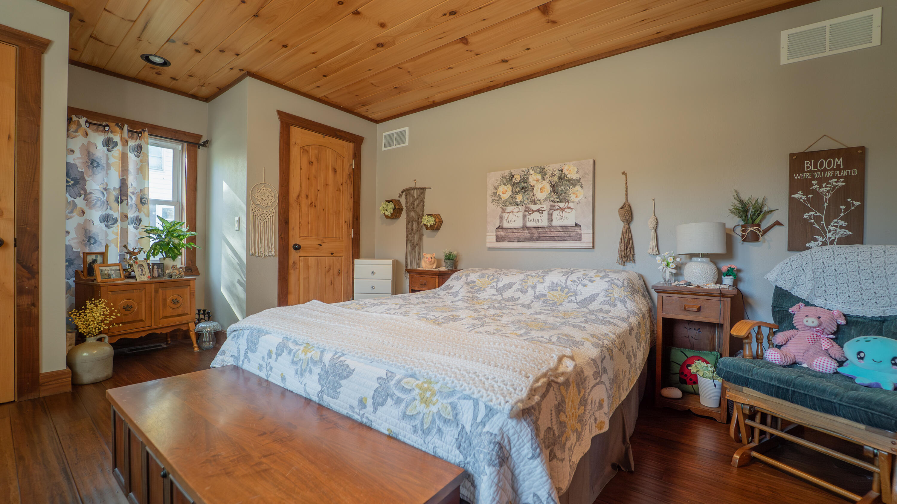 5099 Sage Road Plymouth, IN 46563 - Photo 10 of 35 a bedroom with a bed and wooden floor