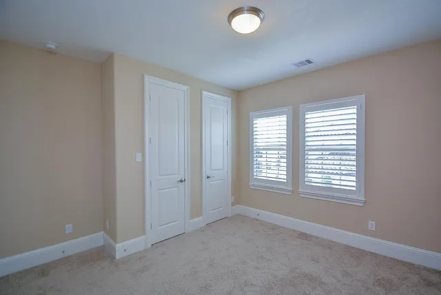 a view of a room that has a window in it