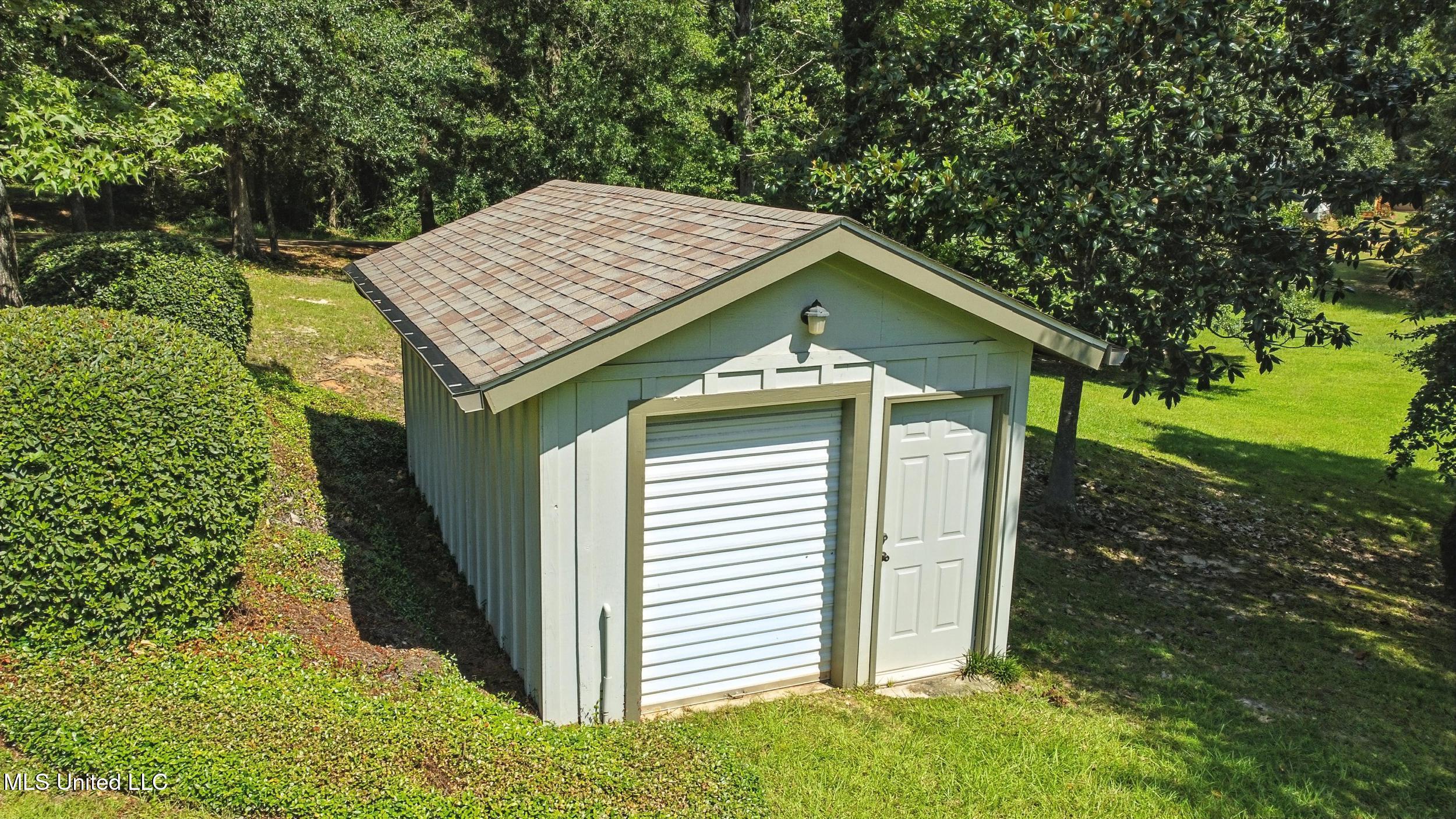 611 West 2nd Avenue Wiggins, MS 39577 - Photo 33 of 40 33_shed