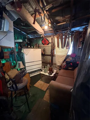 a view of a chairs and tables in patio