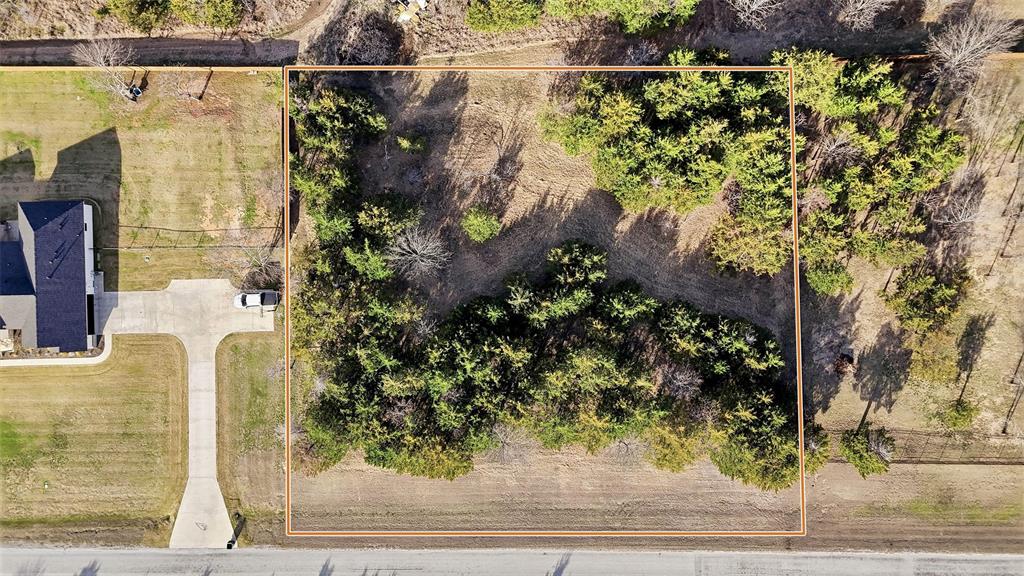 497 Brandon Way Pottsboro, TX 75076 - Photo 15 of 25 a view of a garden from a house