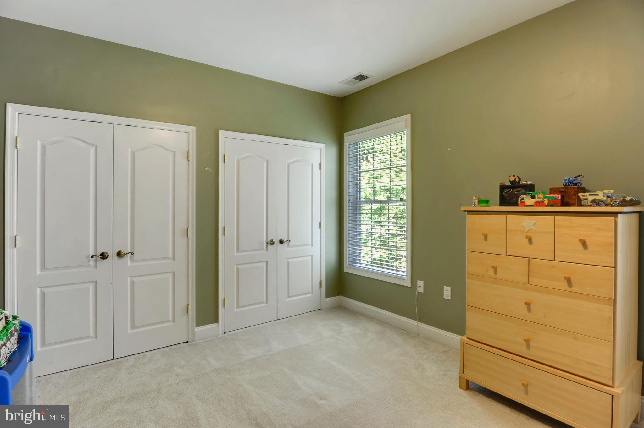 9440 Billingsley Road White Plains, MD 20695 - Photo 18 of 30 a room with a dresser and a window