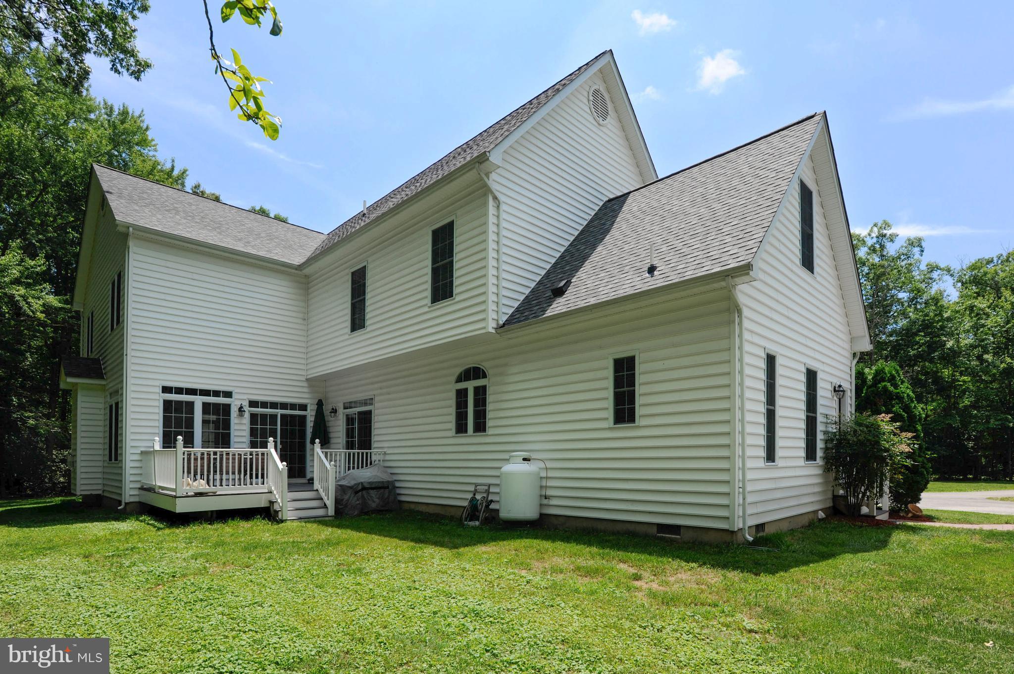 9440 Billingsley Road White Plains, MD 20695 - Photo 23 of 30 a view of a house with a backyard