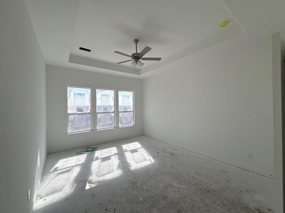 780 County Road 200 Valley View, TX 76272 - Photo 5 of 8 an empty room with windows and fan