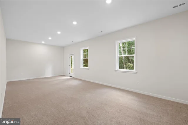 a view of a room with yard and balcony