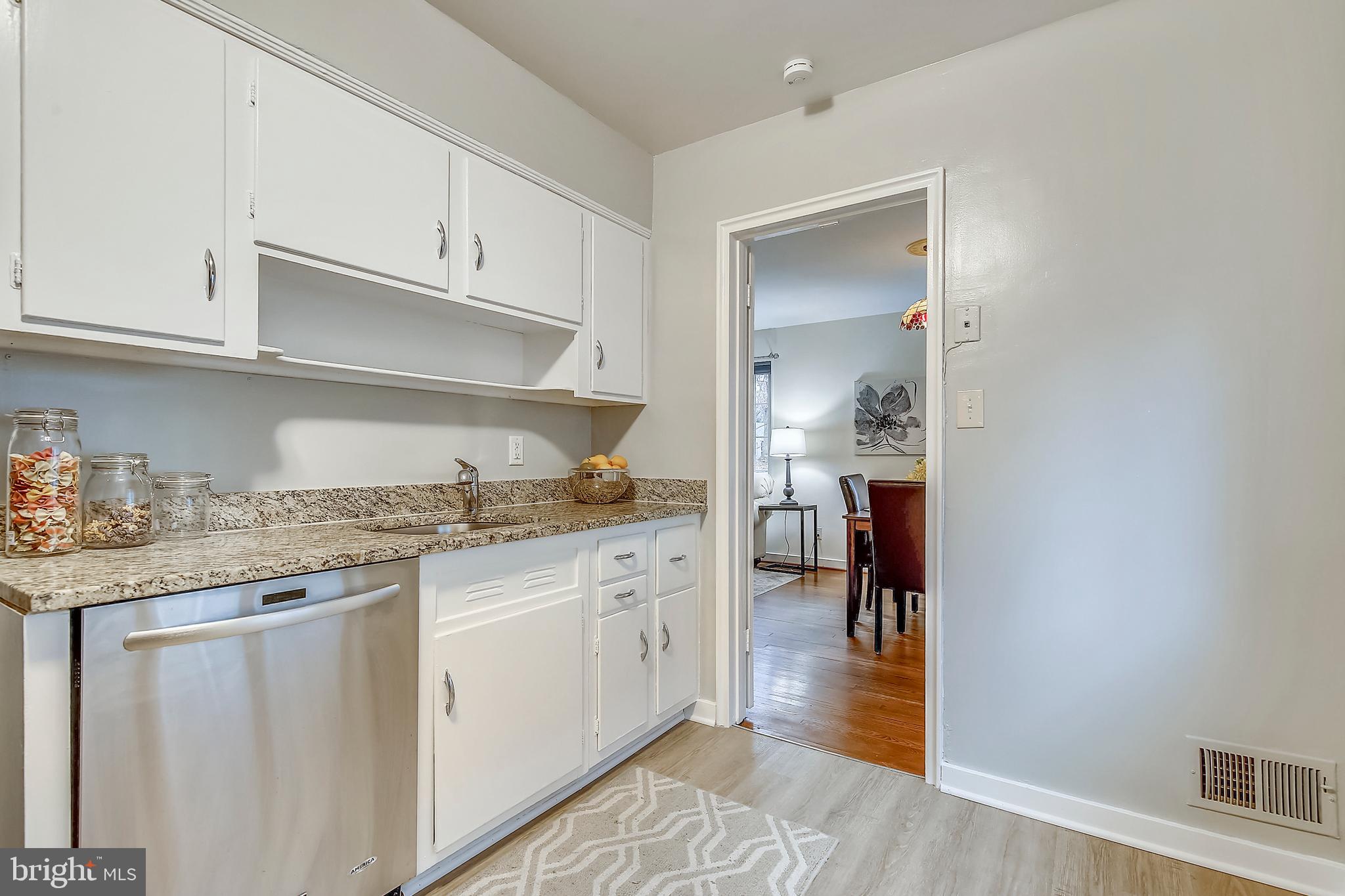 6 Devon Road Silver Spring, MD 20910 - Photo 13 of 38 Galley kitchen with updated granite counters
