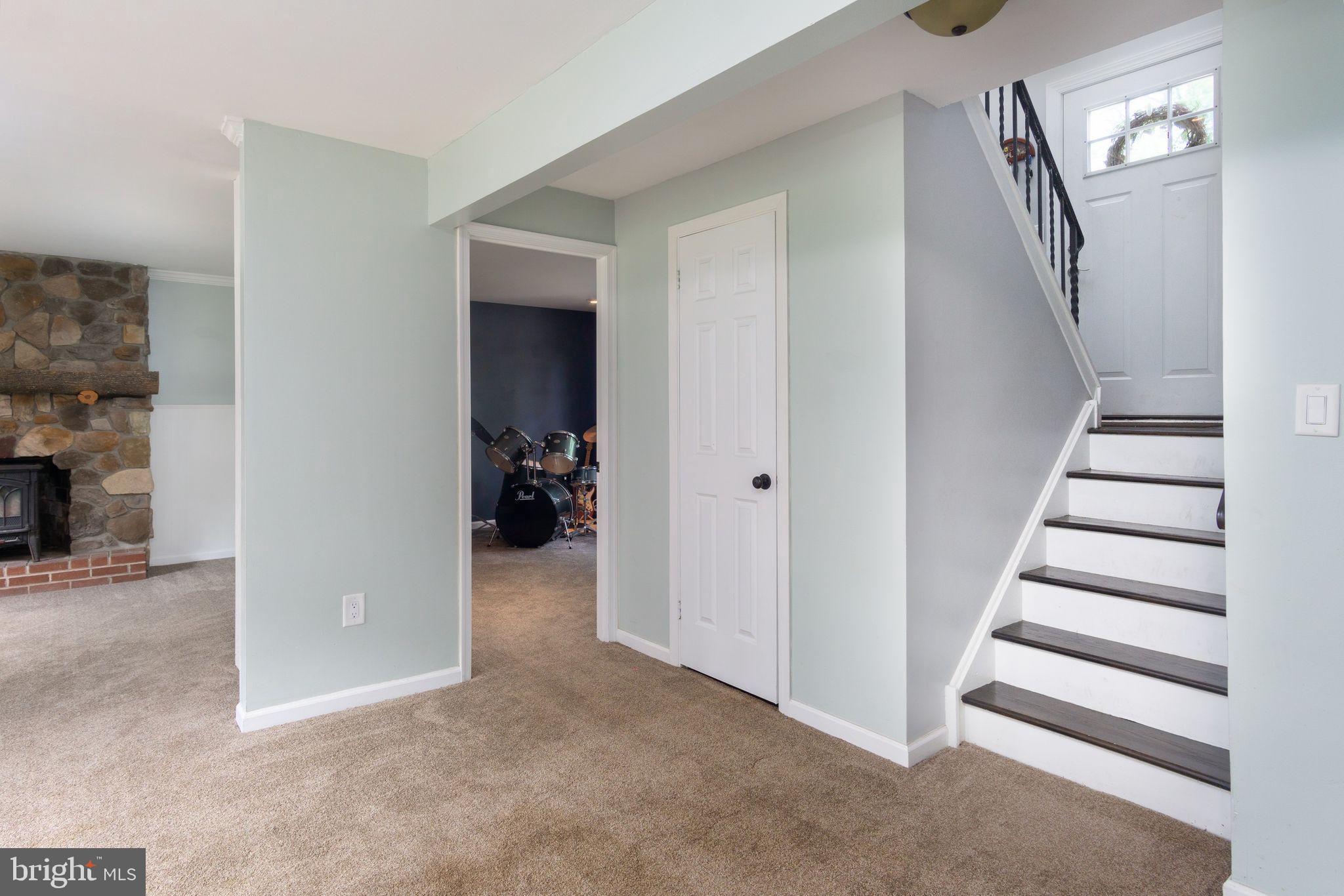 454 Moyer Road Harleysville, PA 19438 - Photo 19 of 35 Lower level family room with view into 4th bedroom