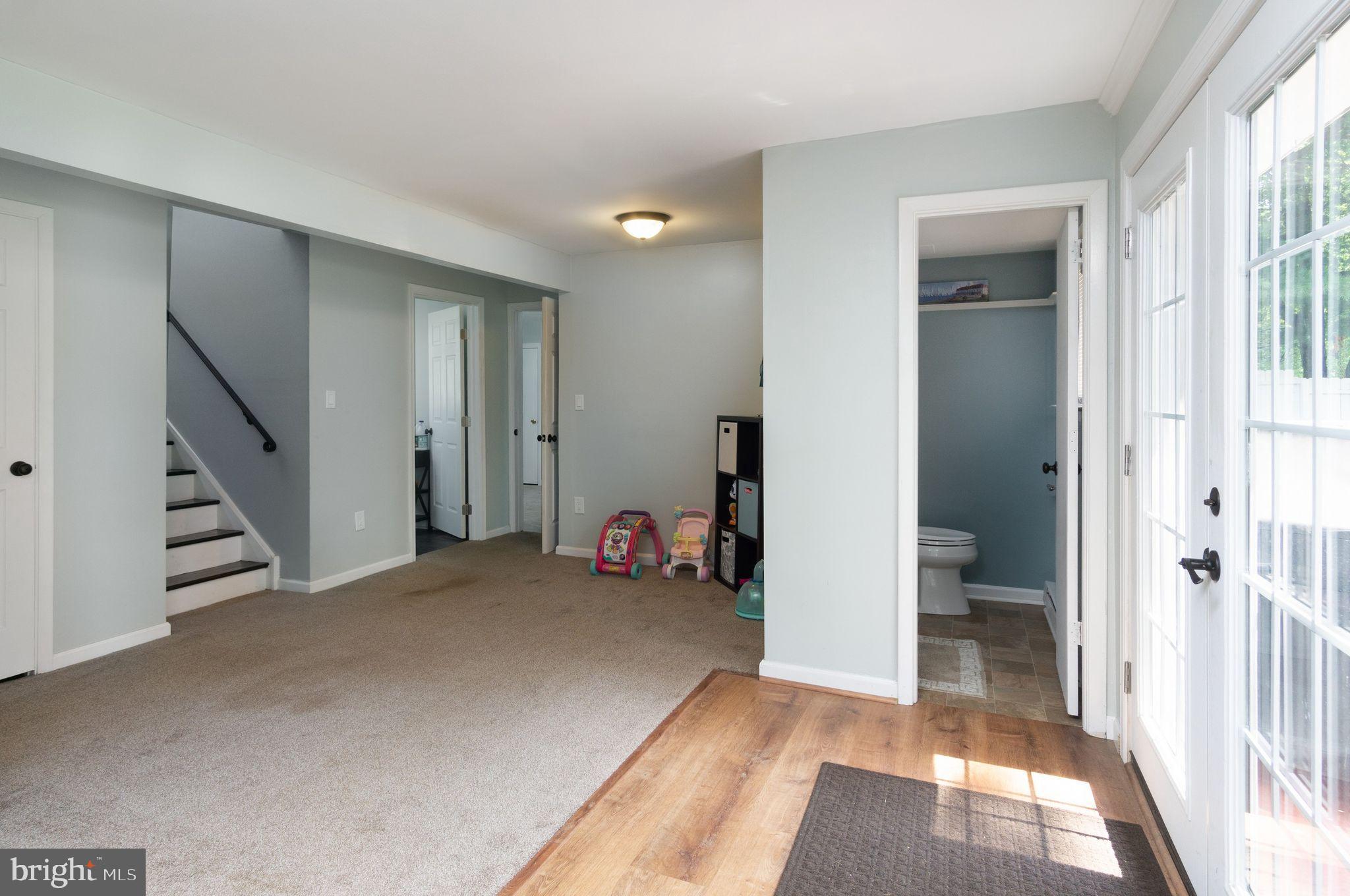 454 Moyer Road Harleysville, PA 19438 - Photo 21 of 35 Lower level family room with updated powder room