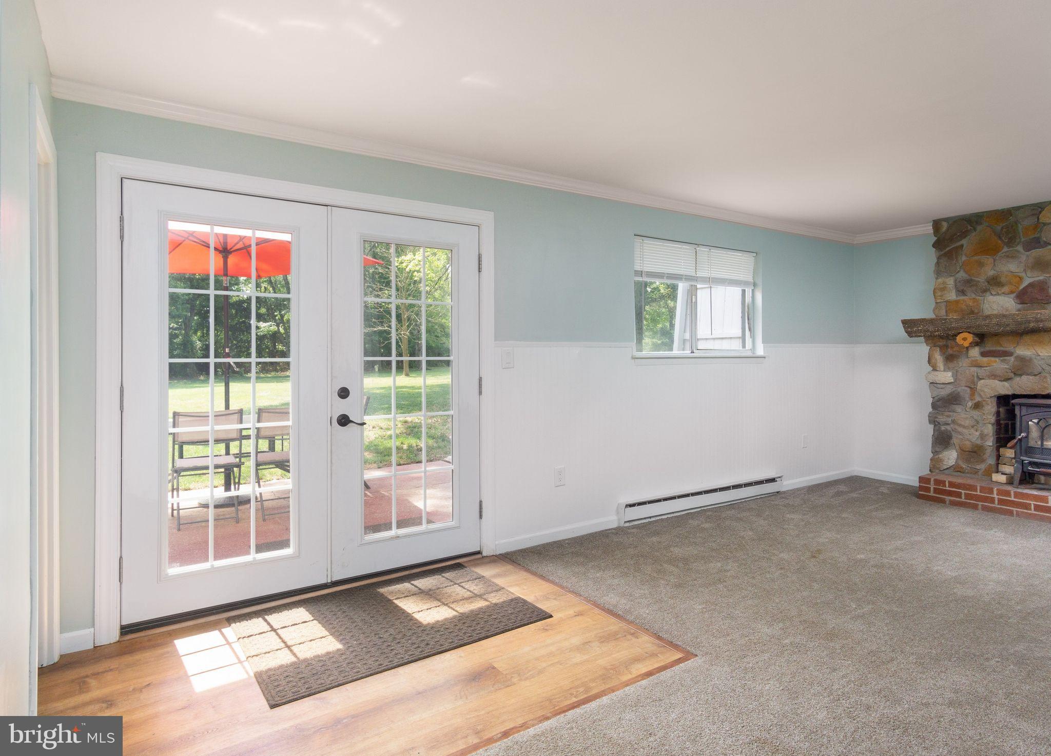 454 Moyer Road Harleysville, PA 19438 - Photo 25 of 35 Family room with exit to back patio and yard