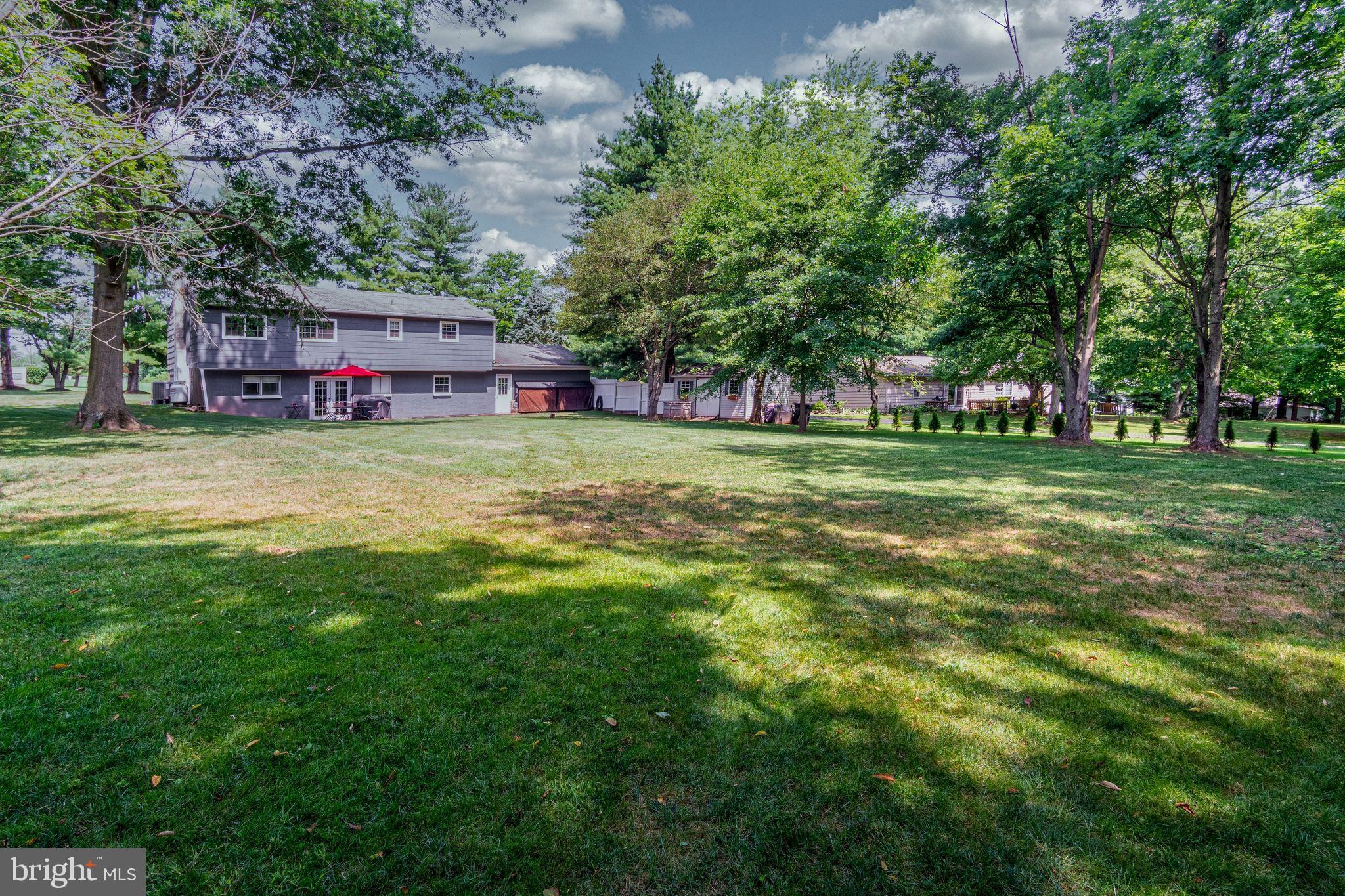 454 Moyer Road Harleysville, PA 19438 - Photo 31 of 35 View of back of house from tree line