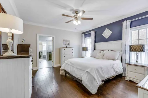 a bathroom with a granite countertop tub sink and shower