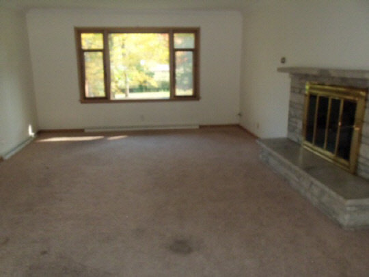 4209 Spring Creek Road Rockford, IL 61107 - Photo 3 of 11 an empty room that has a window