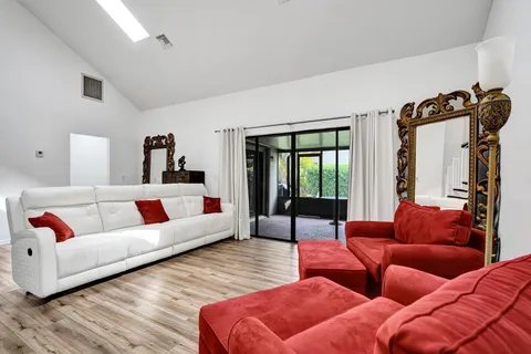 a living room with furniture and a couch