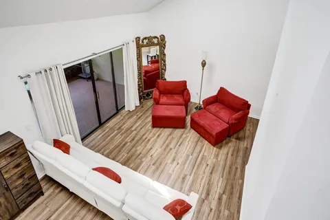 a living room with furniture and a couch