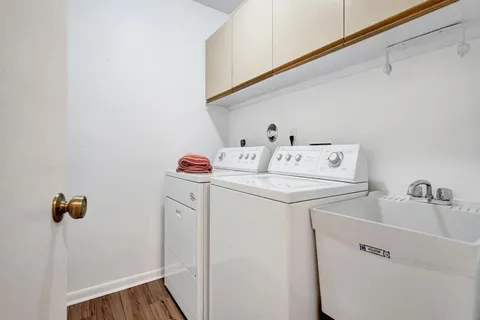 a view of a swimming pool with a chair