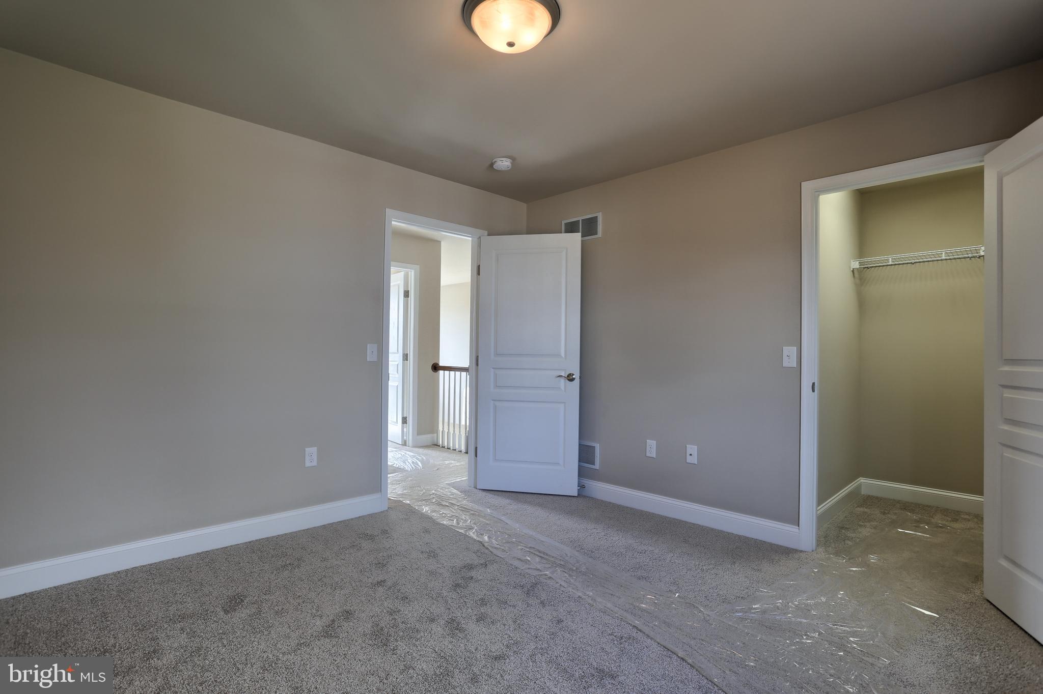 5 Rolling Meadow Road Lebanon, PA 17046 - Photo 12 of 35 an empty room with closet and mirror
