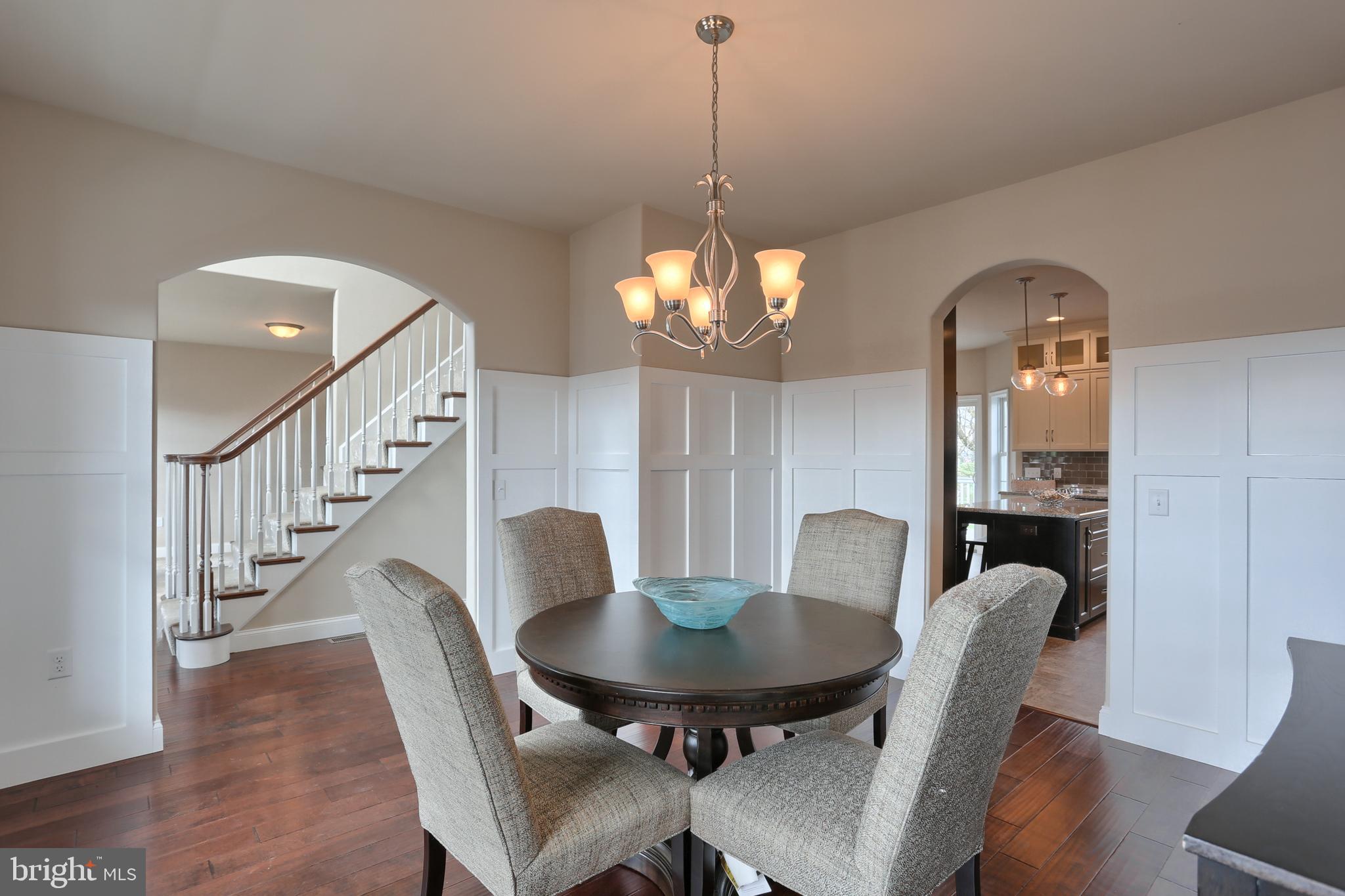5 Rolling Meadow Road Lebanon, PA 17046 - Photo 18 of 35 a view of a dining room with furniture and wooden floor