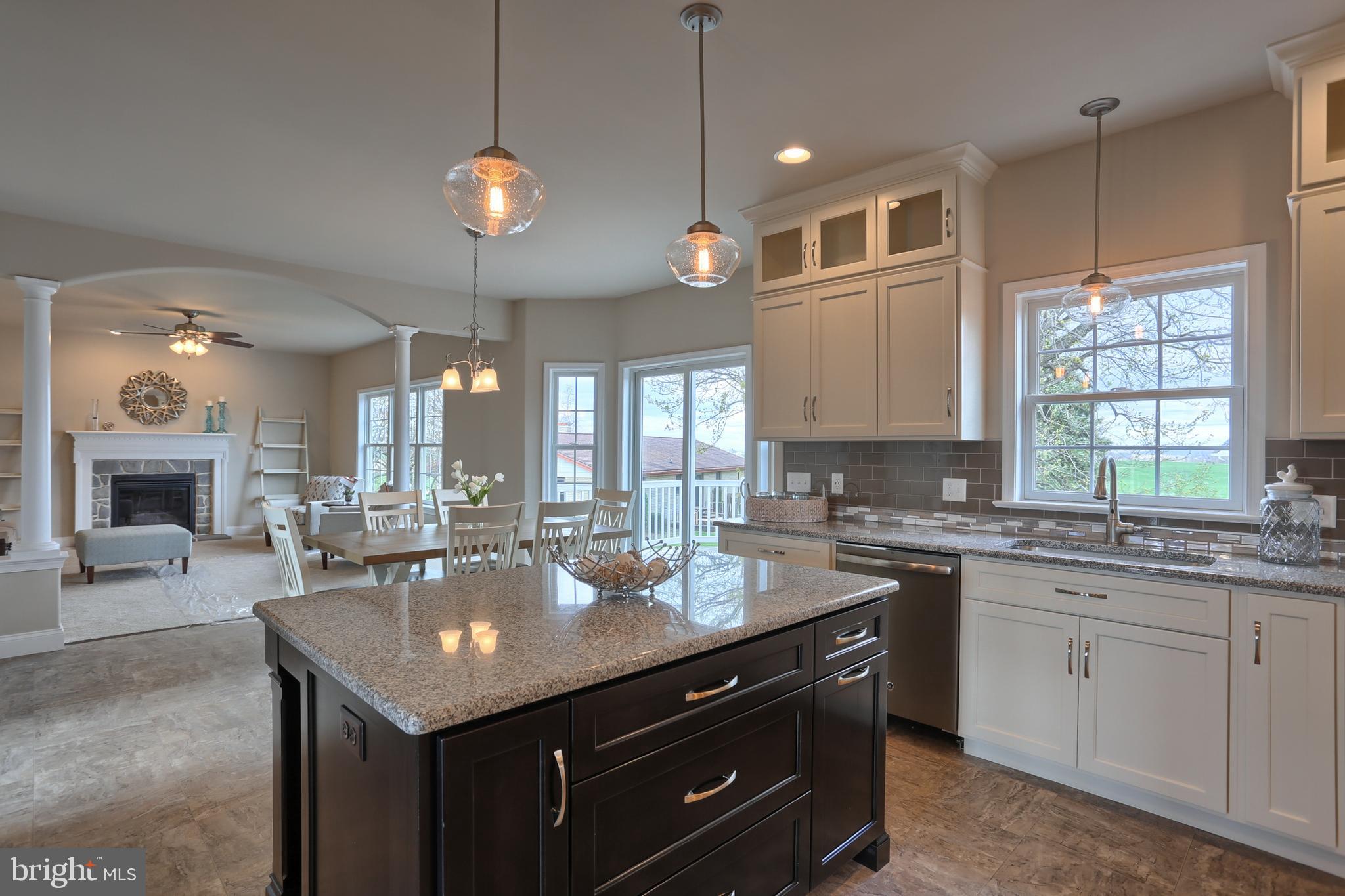 5 Rolling Meadow Road Lebanon, PA 17046 - Photo 21 of 35 a kitchen with a sink a center island and cabinets