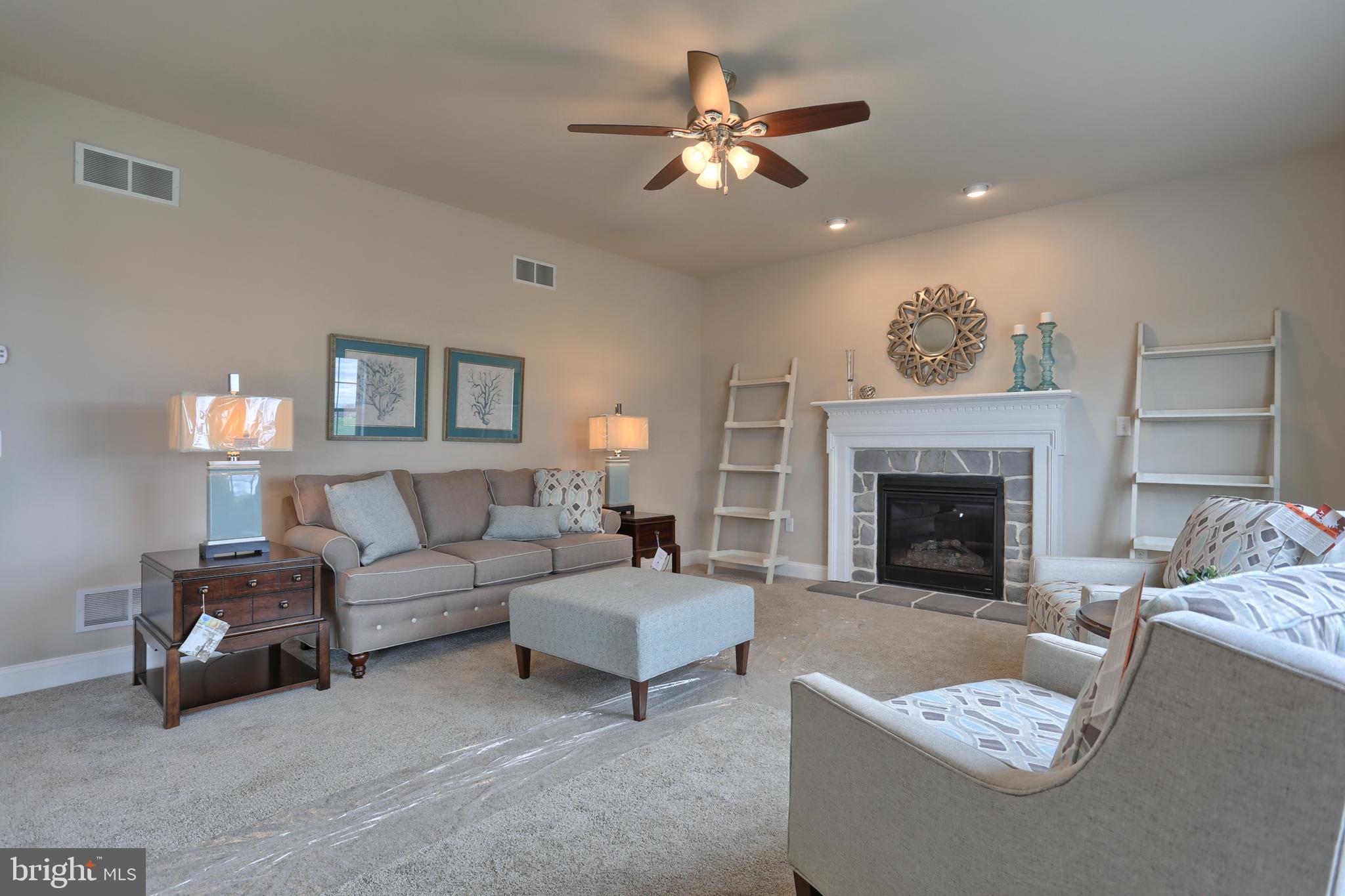 5 Rolling Meadow Road Lebanon, PA 17046 - Photo 24 of 35 a living room with furniture and a fireplace