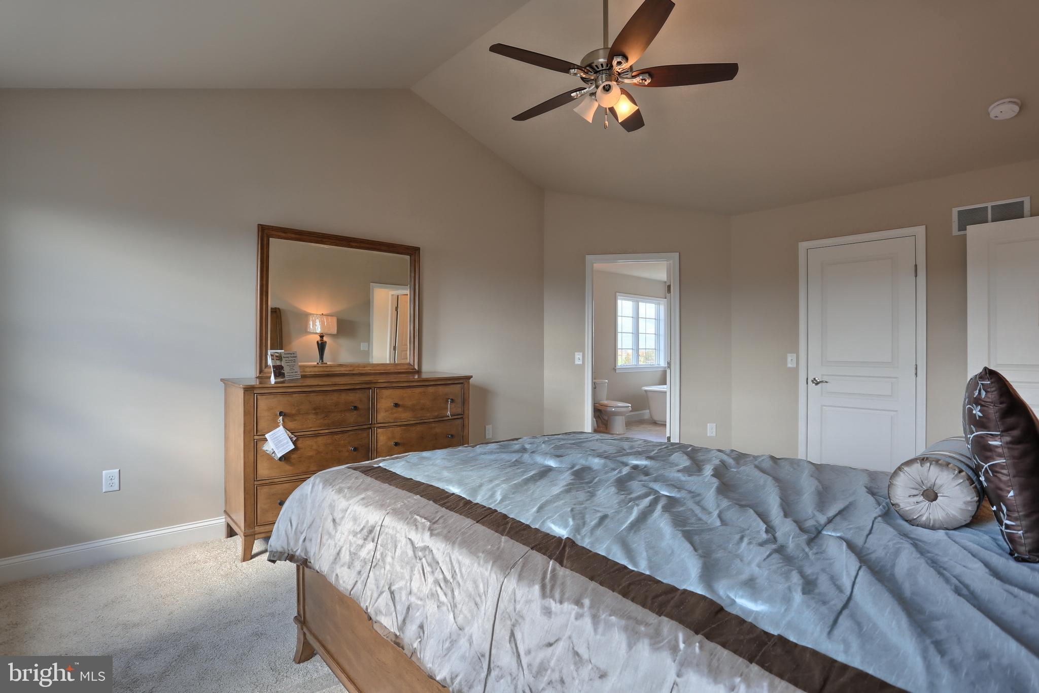 5 Rolling Meadow Road Lebanon, PA 17046 - Photo 26 of 35 a bedroom with a bed and a chandelier