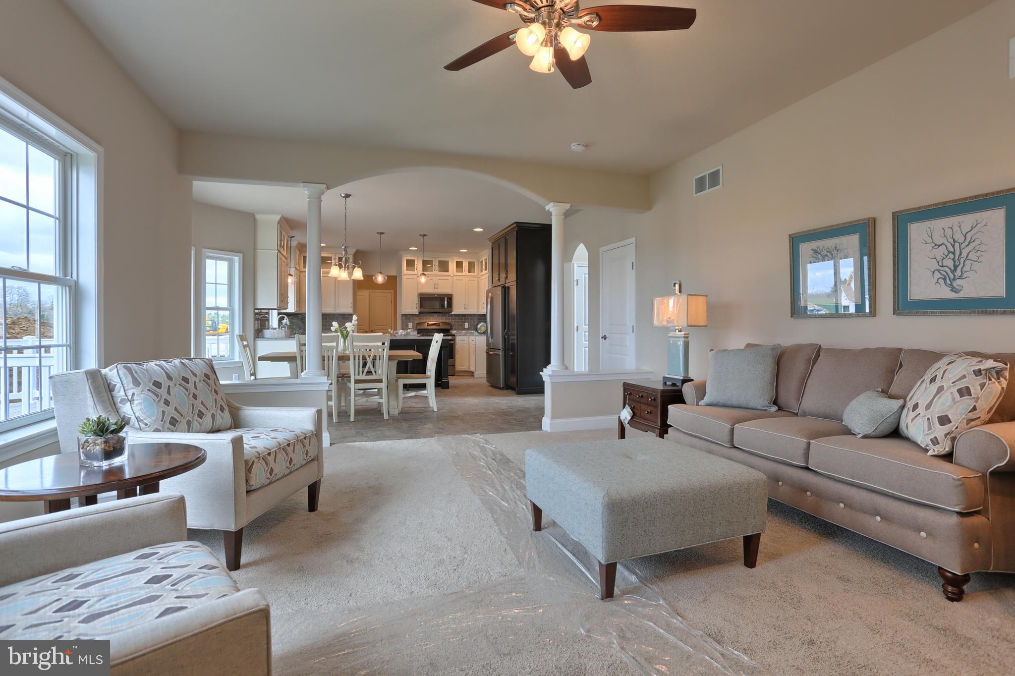 5 Rolling Meadow Road Lebanon, PA 17046 - Photo 28 of 35 a living room with furniture and a chandelier