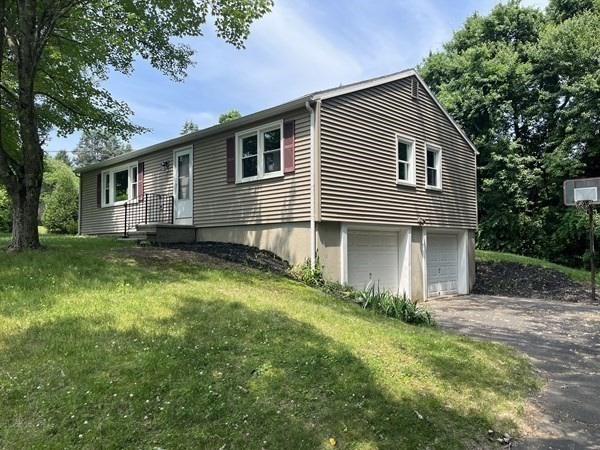 31 Meadow Road Ware, MA 01082 - Photo 1 of 22 a view of a house with backyard and garden