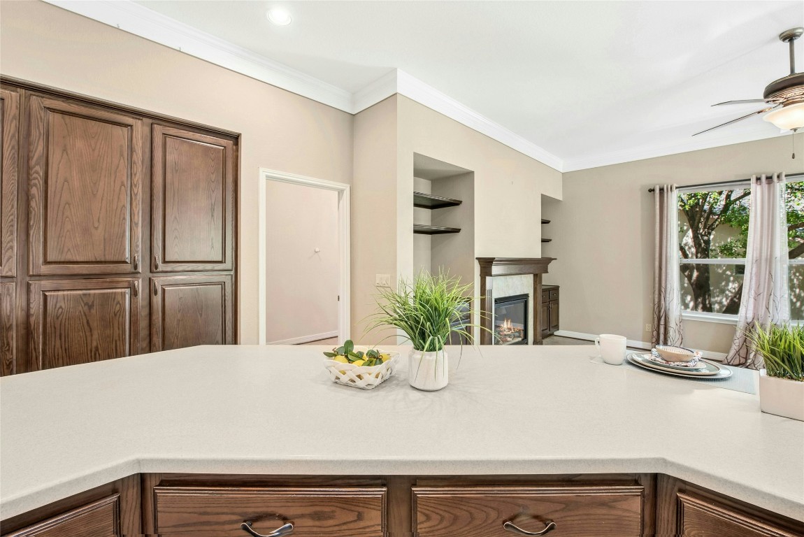 316 Trail Of The Flowers Georgetown, TX 78633 - Photo 12 of 40 a view of kitchen with kitchen island and living room
