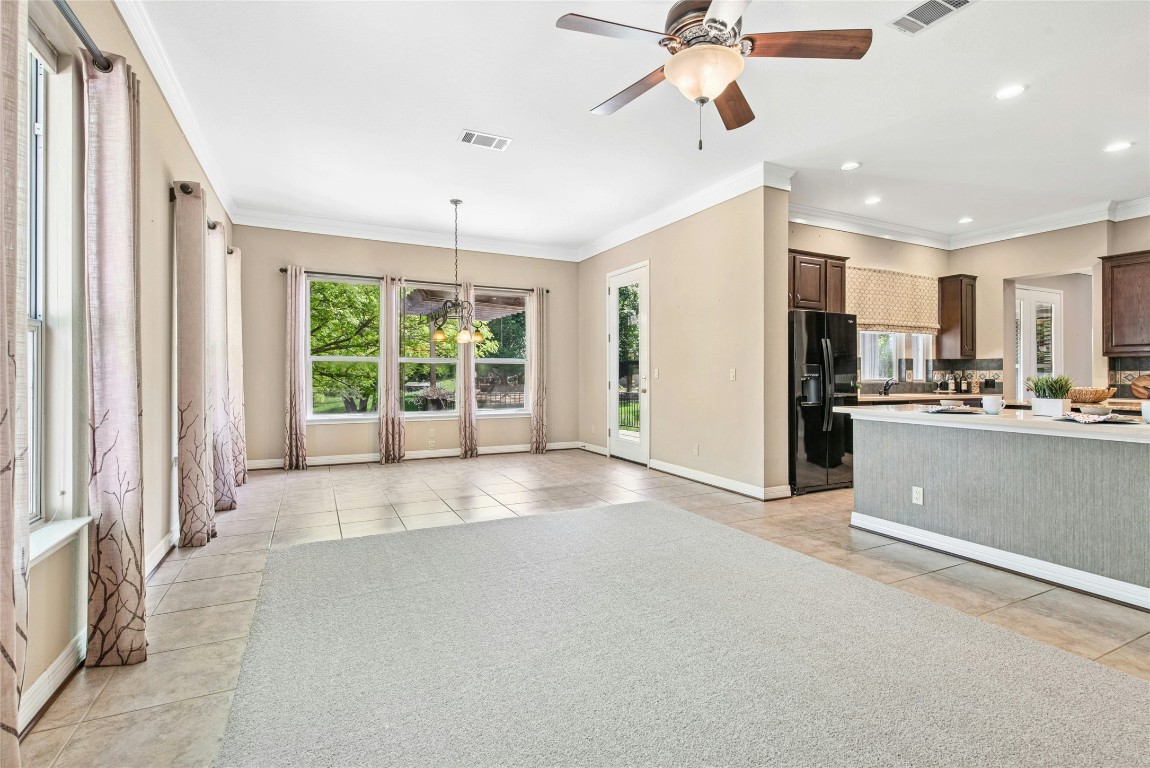 316 Trail Of The Flowers Georgetown, TX 78633 - Photo 14 of 40 a view of a kitchen with a sink and a window