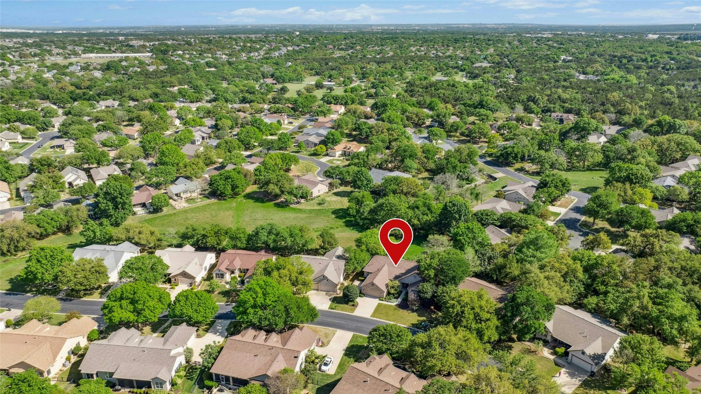 316 Trail Of The Flowers Georgetown, TX 78633 - Photo 2 of 40 a view of a bunch of trees and a houses