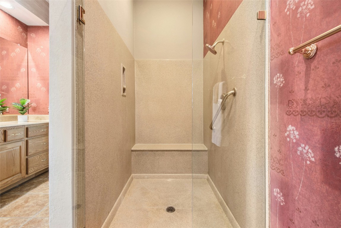 316 Trail Of The Flowers Georgetown, TX 78633 - Photo 23 of 40 a bathroom with a bath tub