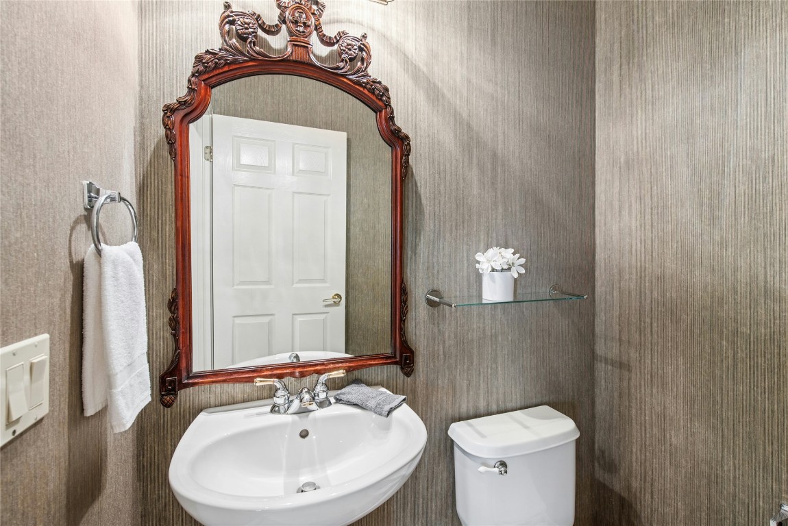 316 Trail Of The Flowers Georgetown, TX 78633 - Photo 29 of 40 a bathroom with a sink a toilet and shower