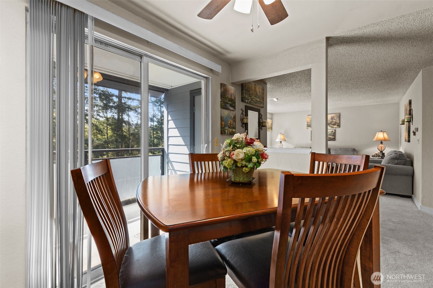 2517 Northeast 4th Street, Unit 523 Renton, WA 98056 - Photo 8 of 32 a view of a dining room with furniture window and wooden floor