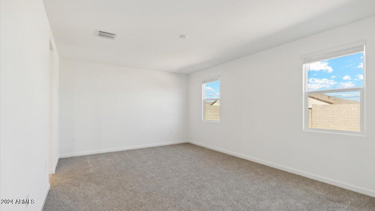 3005 Simone Avenue Apache Junction, AZ 85120 - Photo 6 of 14 justin primary bedroom