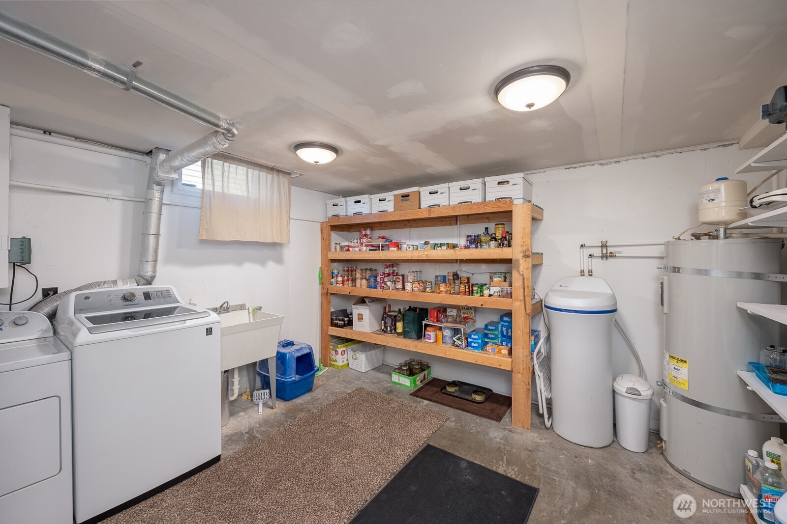 303 Patrick Road Ephrata, WA 98823 - Photo 32 of 38 a room with storage and utility