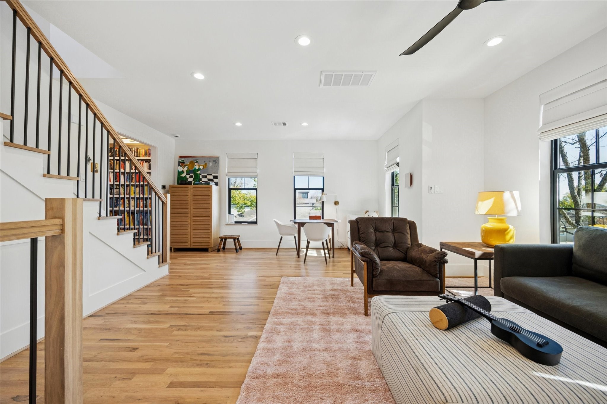 701 Ridge Street Houston, TX 77009 - Photo 24 of 50 Alternate game room view, bedrooms down the hall on left past built-ins.