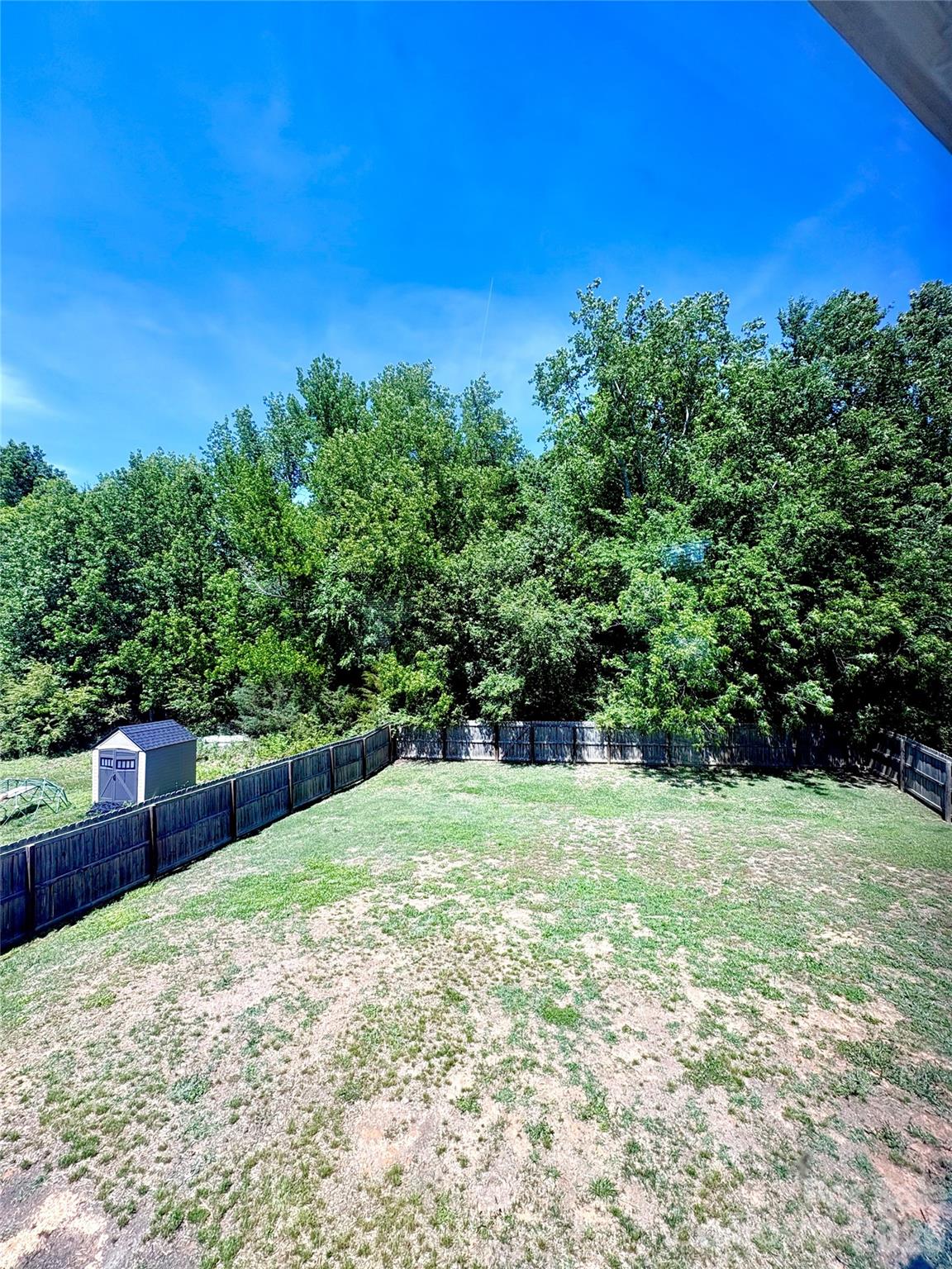 2514 Spring Breeze Way Monroe, NC 28110 - Photo 23 of 25 a view of a yard with a tree