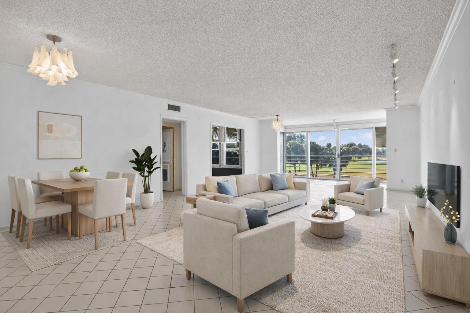 555 Oaks Lane, Unit 207 Pompano Beach, FL 33069 - Photo 2 of 63 Living - Dining Room